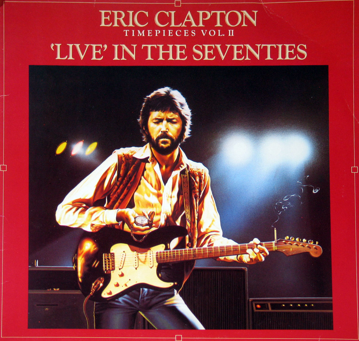 Eric Clapton Timepieces Vol. II album cover featuring an illustrated Eric Clapton holding a black Stratocaster guitar, dressed in 1970s attire, against a stage light background.